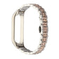 Seven-bead stainless steel watch strap, silver with rose-gold link rows and clasp.