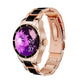 Rose gold touch screen smart bracelet with black frame and purple floral screen showing 20 and 37.