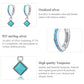 Sterling silver earrings featuring turquoise square drops and blue stone hoop detailing