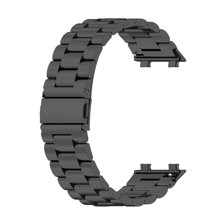 Black three-bead stainless steel watch strap with deployant clasp, angled view.