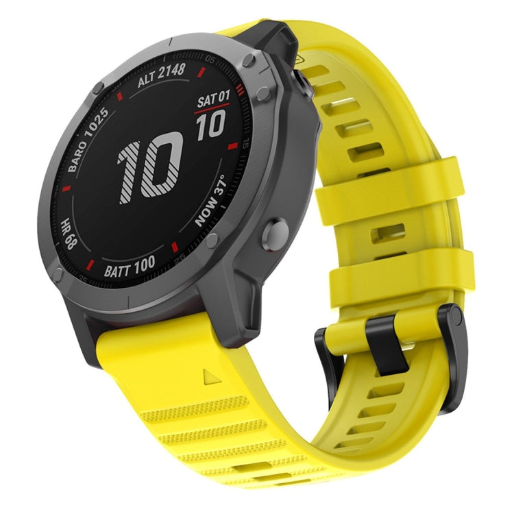 Yellow silicone smartwatch replacement strap with perforated texture and quick-fit buckle