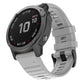 Grey silicone smartwatch replacement strap with perforated texture and adjustable buckle