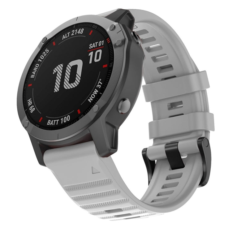 Grey silicone smartwatch replacement strap with perforated texture and adjustable buckle