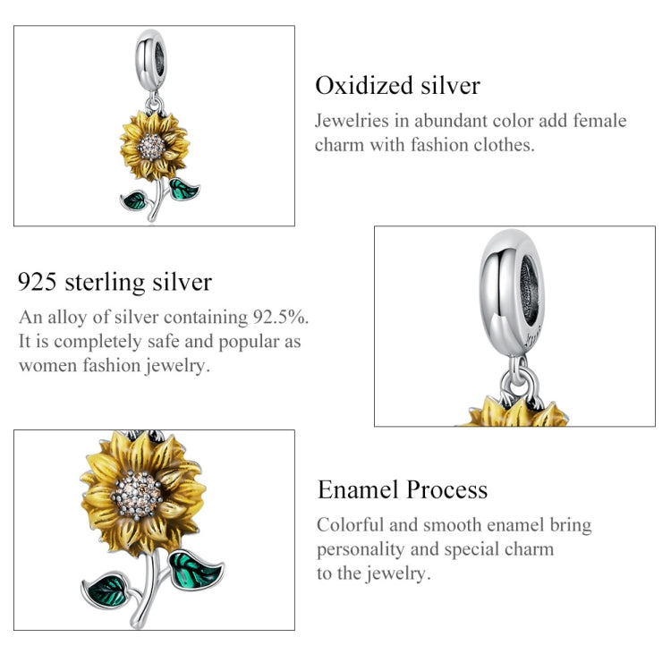 Sunflower charm pendant with silver clasp, yellow flower and green enamel leaves detail