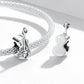 Sterling silver violin charm bead on mesh bracelet chain, side-by-side view