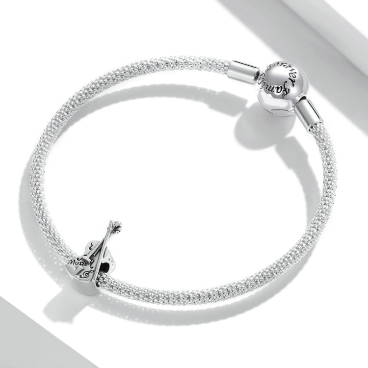 Sterling silver violin charm bead on mesh bracelet chain, circular layout