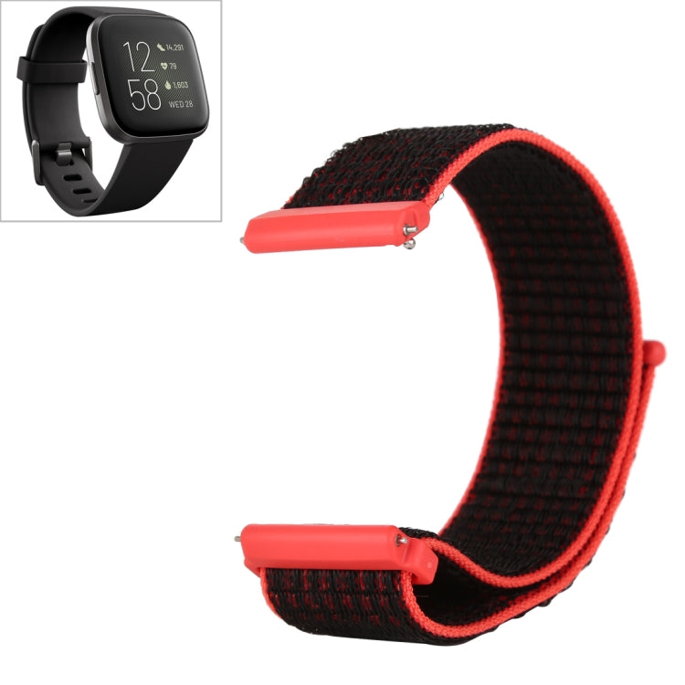 Black nylon watch band with red trim and hook-and-loop closure, snap connectors