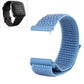 Blue nylon watch band with hook-and-loop closure and blue snap connectors