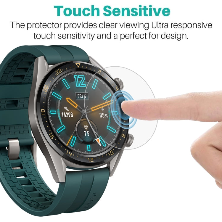 Touch control screen protector on smartwatch; finger tapping a clear film overlay