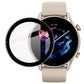Round transparent film overlay on smartwatch screen, tan strap and watch face