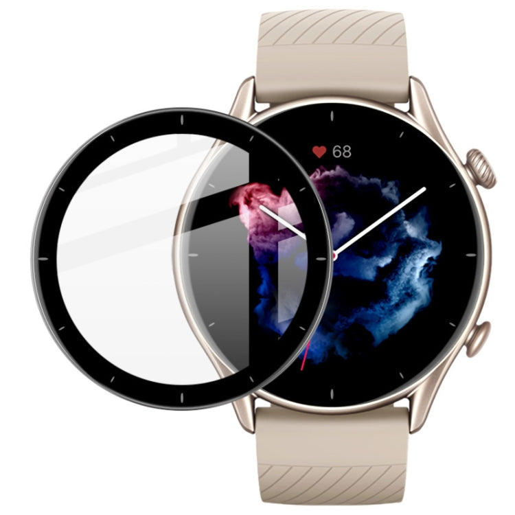 Round transparent film overlay on smartwatch screen, tan strap and watch face
