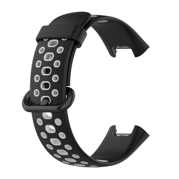 Two-tone silicone watch band, black with white oval dot holes and clasp tabs