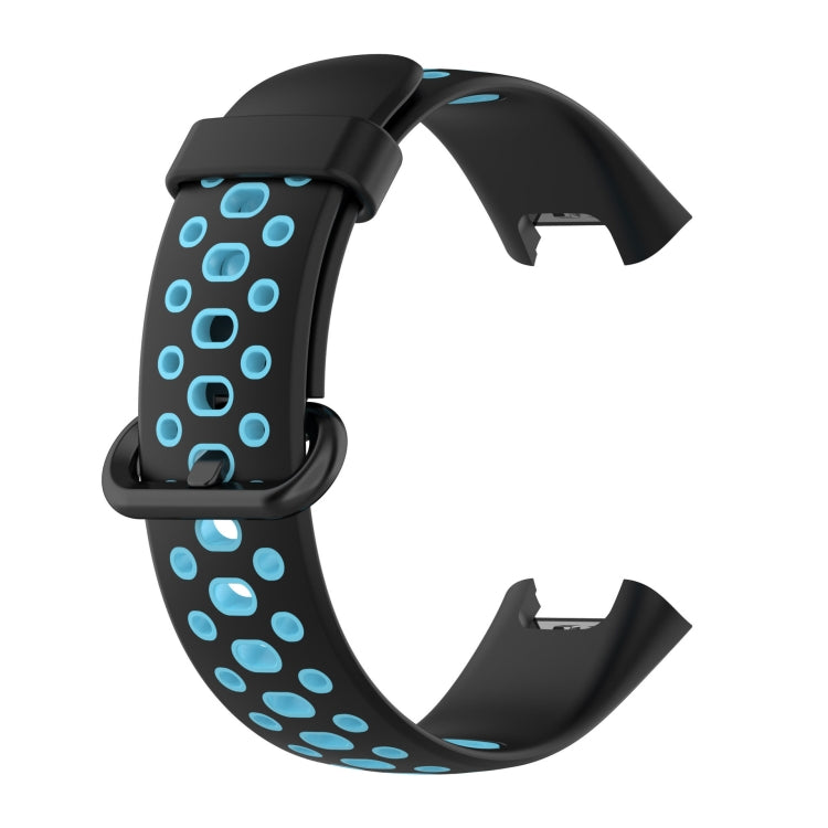 Two-tone silicone watch band, black with blue oval dot holes and clasp tabs