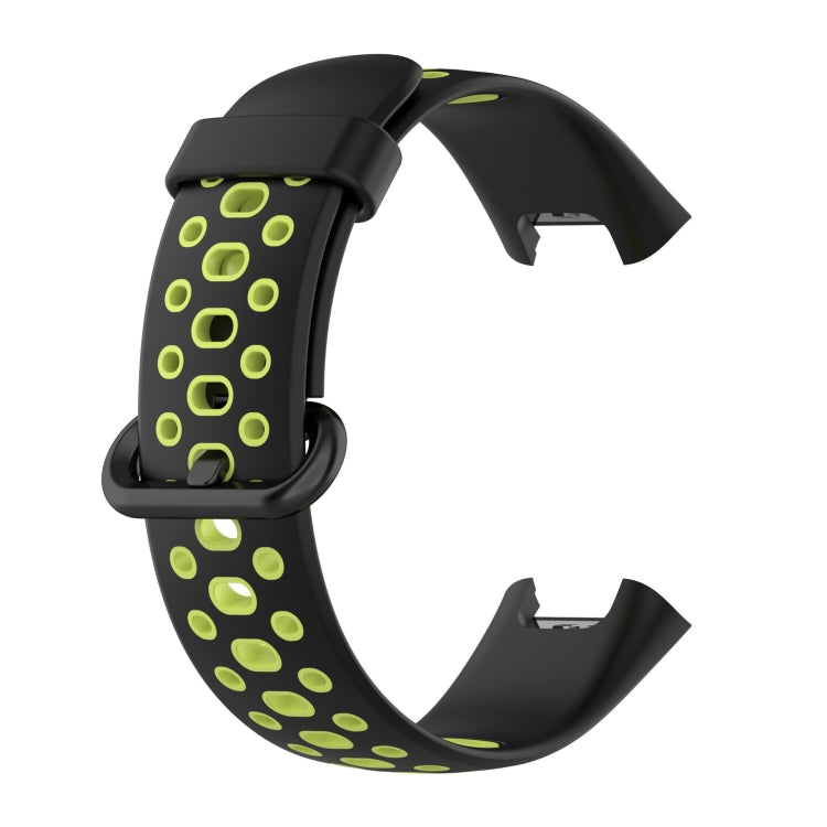 Two-tone silicone watch band, black with lime green oval dot holes and clasp tabs