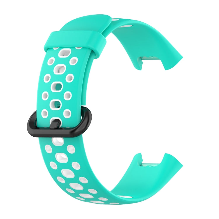 Two-tone silicone watch band, teal with white oval dot holes and clasp tabs