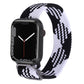 Black and white patterned nylon braid watchband with metal clasp and woven texture