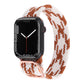 Nylon braided watch band with white and rust chevron weave and metal buckle.