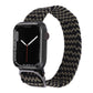Nylon braided watch band with black and beige houndstooth weave and metal buckle.