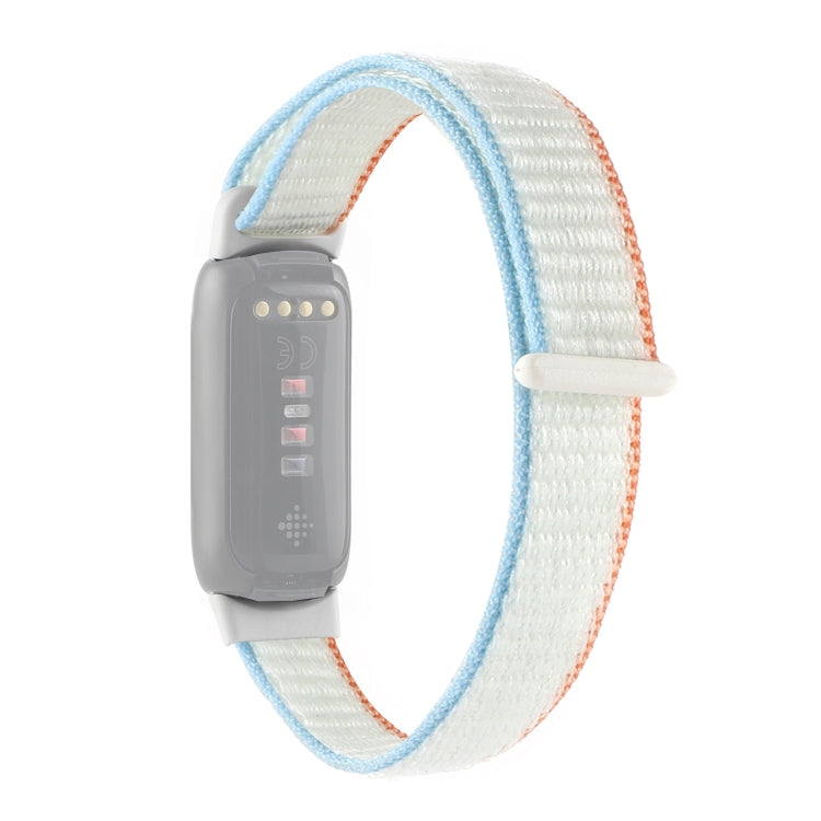 Light blue and white nylon loop watchband with quick-snap clasp for Fitbit Luxe