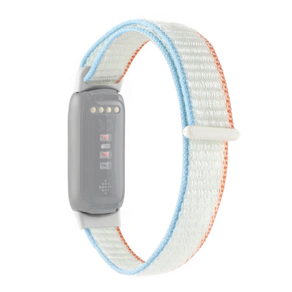 Light blue and white nylon loop watchband with quick-snap clasp for Fitbit Luxe