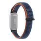 Navy nylon loop watchband with orange edge stitching and black clasp for Fitbit Luxe