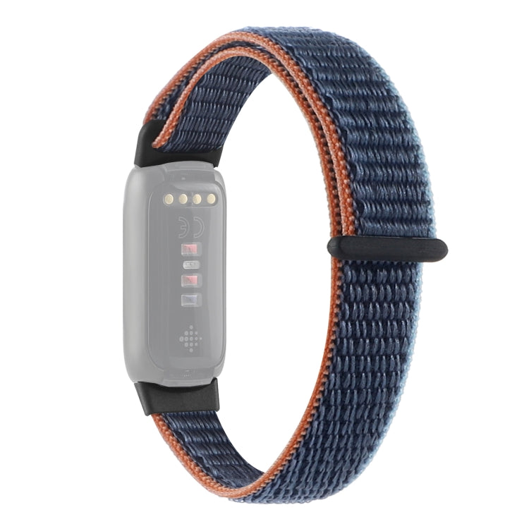 Navy nylon loop watchband with orange edge stitching and black clasp for Fitbit Luxe
