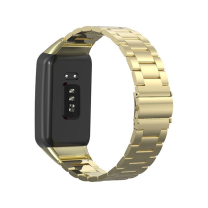 Gold stainless steel three-bead watchband on black smartwatch case, metal link design