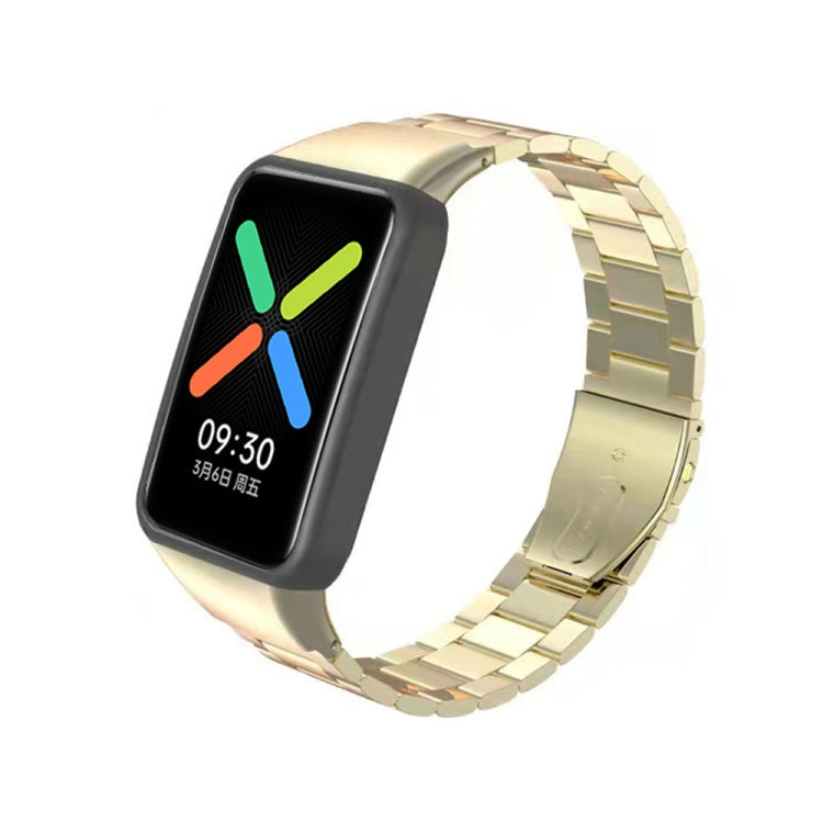 Gold stainless steel three-bead watchband on black smartwatch, glowing color display