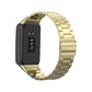 Gold stainless steel three-bead watchband on black smartwatch case, front view