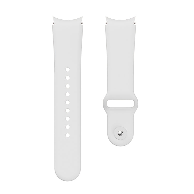 White silicone watch band with reverse buckle and long row of adjustment holes.