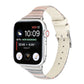 White genuine leather watch band with striped lining, featuring multiple strap holes