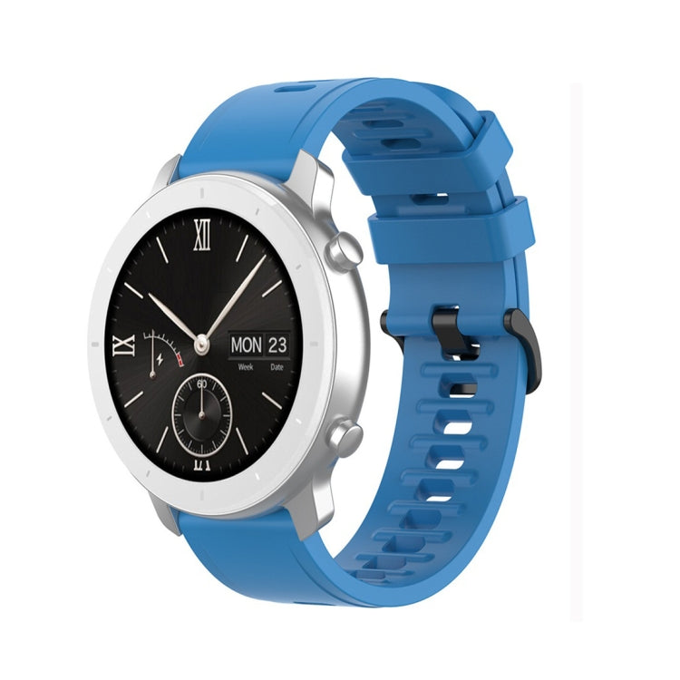 Silicone watch replacement strap, blue with perforated buckle on smartwatch
