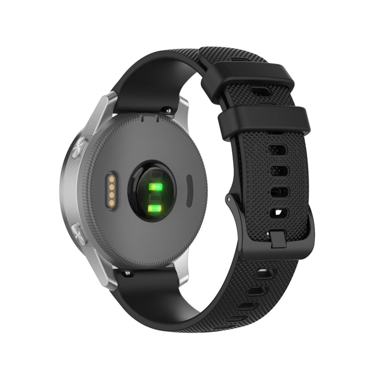 Black silicone smartwatch strap with textured surface and rectangular clasp