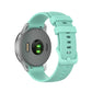 Silicone smartwatch replacement strap in mint green, textured band with multiple adjustment holes