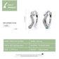 Snake ear buckle earrings in sterling silver with green eye accents, pair view