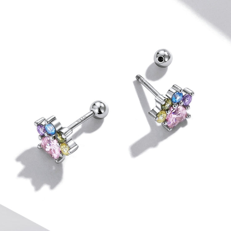 Color zircon claw ear stud earrings, angled view with pink and blue stone clusters