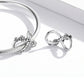 Sterling silver bracelet clasp with infinity and flower charm dangle