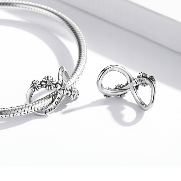 Sterling silver bracelet clasp with infinity and flower charm dangle