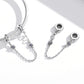 Silver bracelet safety chain with purple flower charm and swivel end loops
