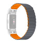 Silicone watch band with dark gray links and orange edge accents