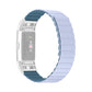 Silicone watch band with light blue links and dark teal accent strip