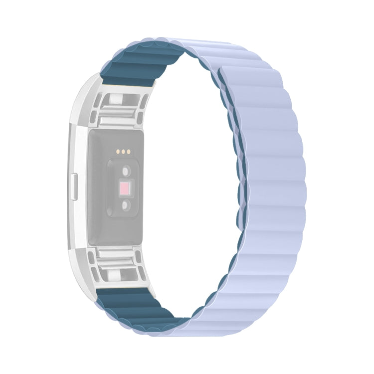 Silicone watch band with light blue links and dark teal accent strip