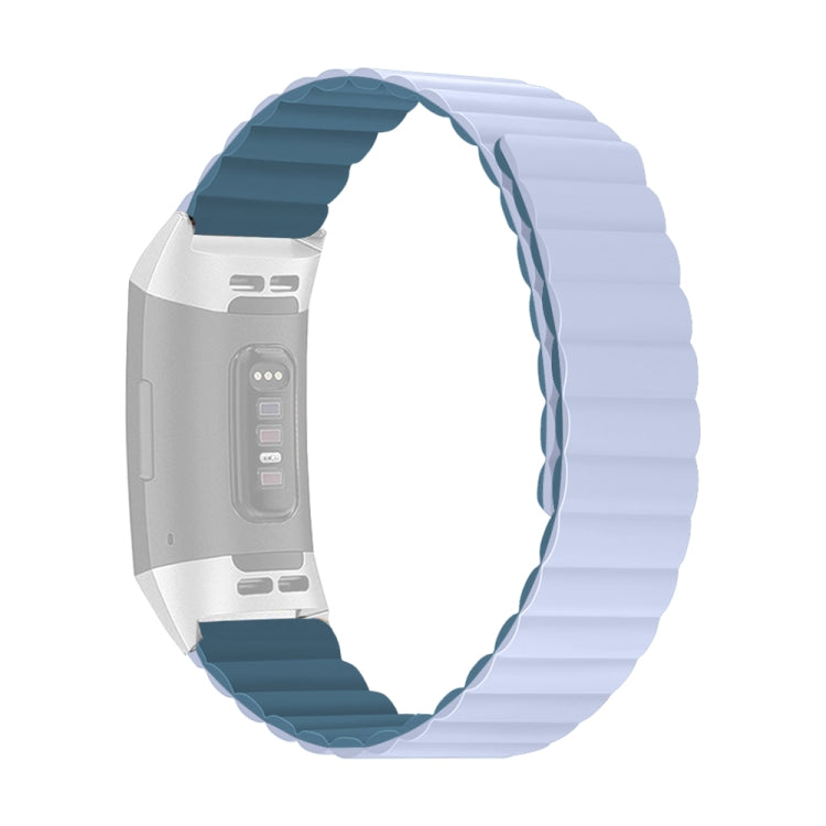 Silicone watch band with light blue links and dark teal accent strip