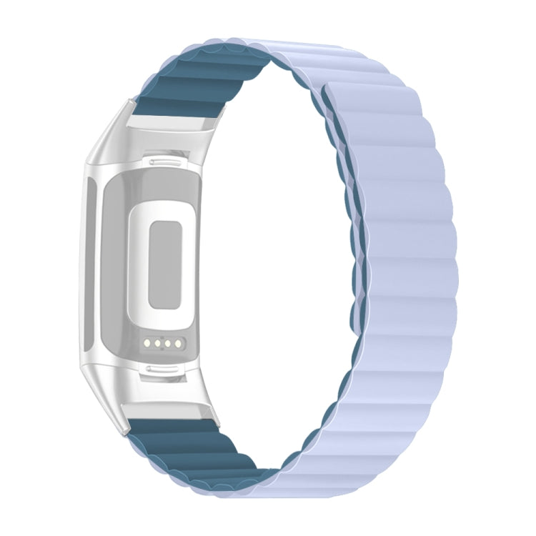 Silicone watch band with light blue links and dark teal accent strip