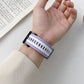 Lavender TPU watch band with multiple holes, shown on an open palm