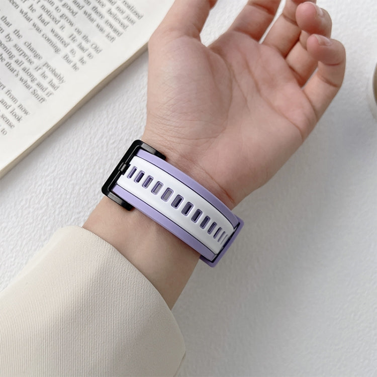 Lavender TPU watch band with multiple holes, shown on an open palm
