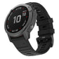 Silicone watch band with buckle, black, for Garmin Fenix smartwatch.
