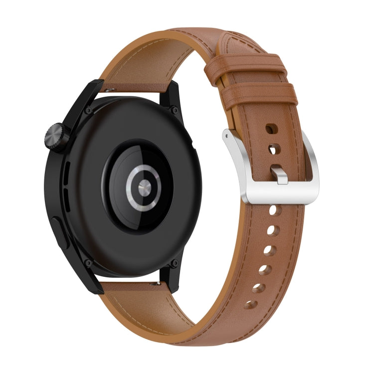 Tan leather watch strap with silver buckle clasp and punched adjustment holes.