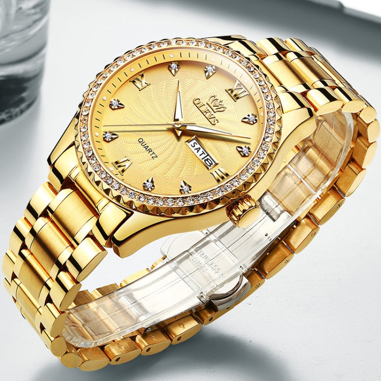 Gold-tone men’s quartz watch with rhinestone bezel, textured dial, and metal band