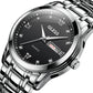 Men's OLEVS quartz watch angled close-up, black dial, date window at 3 o'clock.